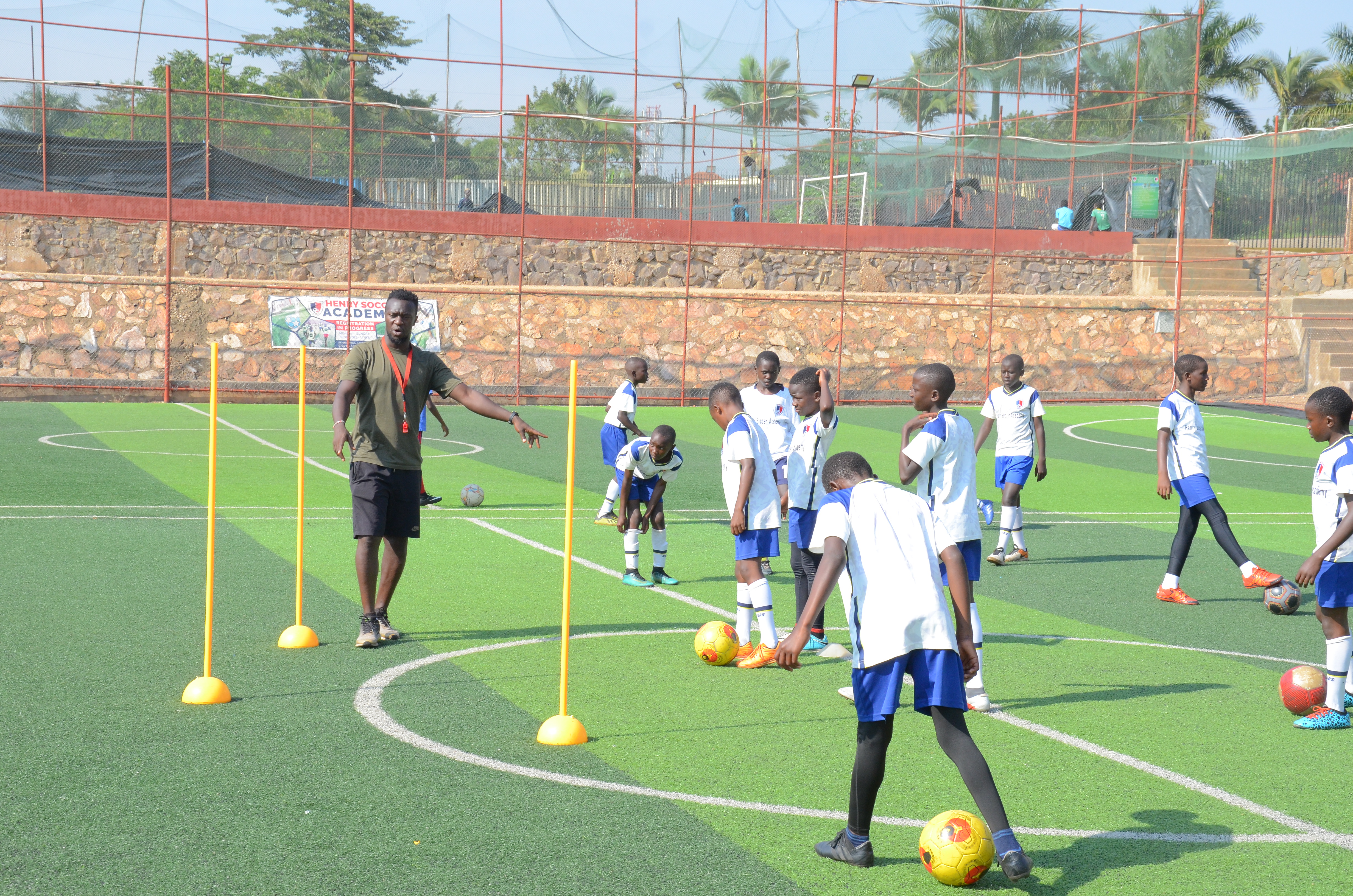 Youth soccer players training together on a field
